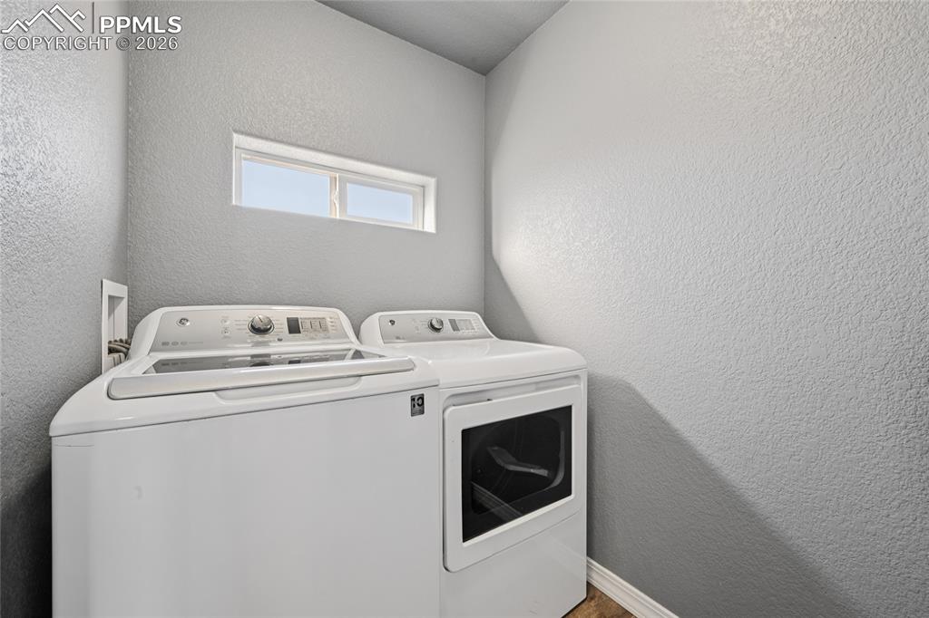 Laundry is upstairs for convenience.