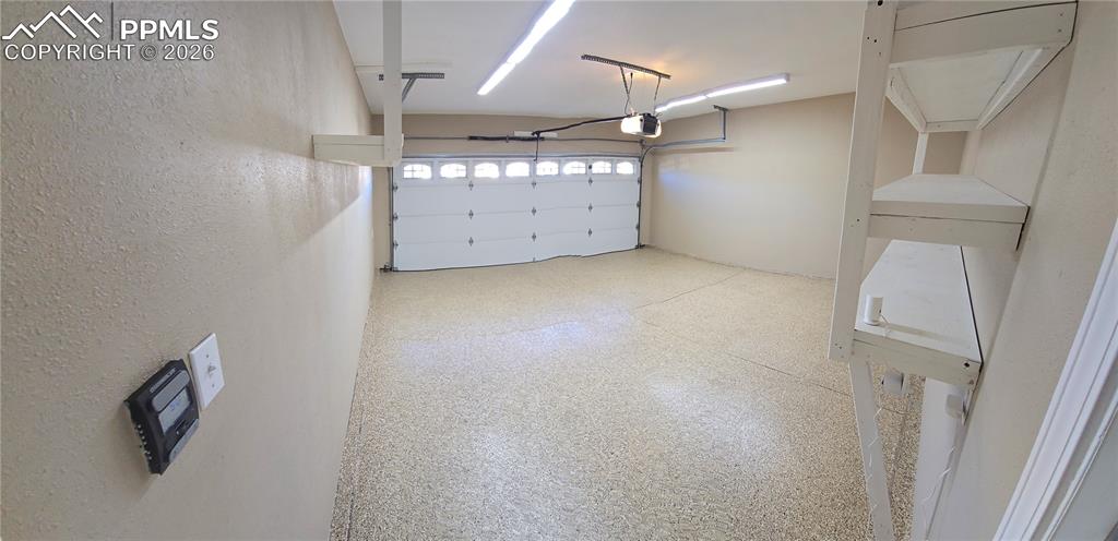 Insulated garage with new epoxy floors.