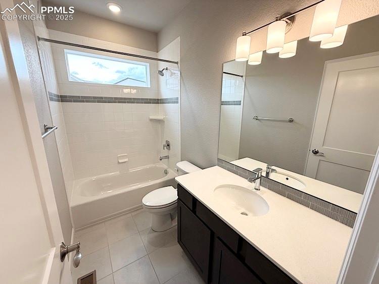 Spacious Great Room featuring a gas fireplace with a beautiful stone surround.