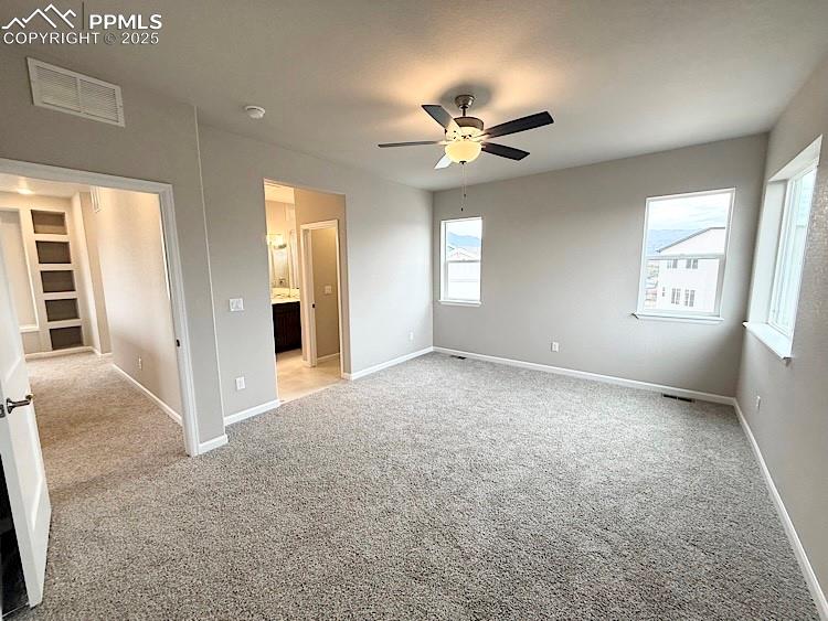 As you step onto the upper level, relax in a cozy sitting nook and take advantage of built-in shelves to showcase your treasures!