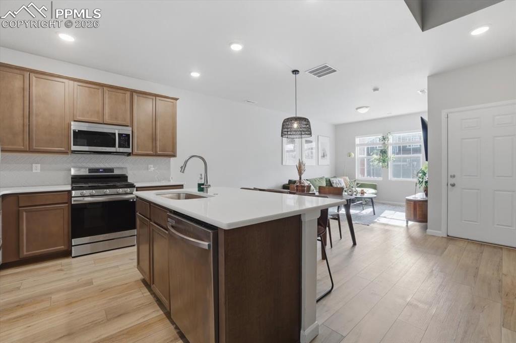 Island with breakfast bar.