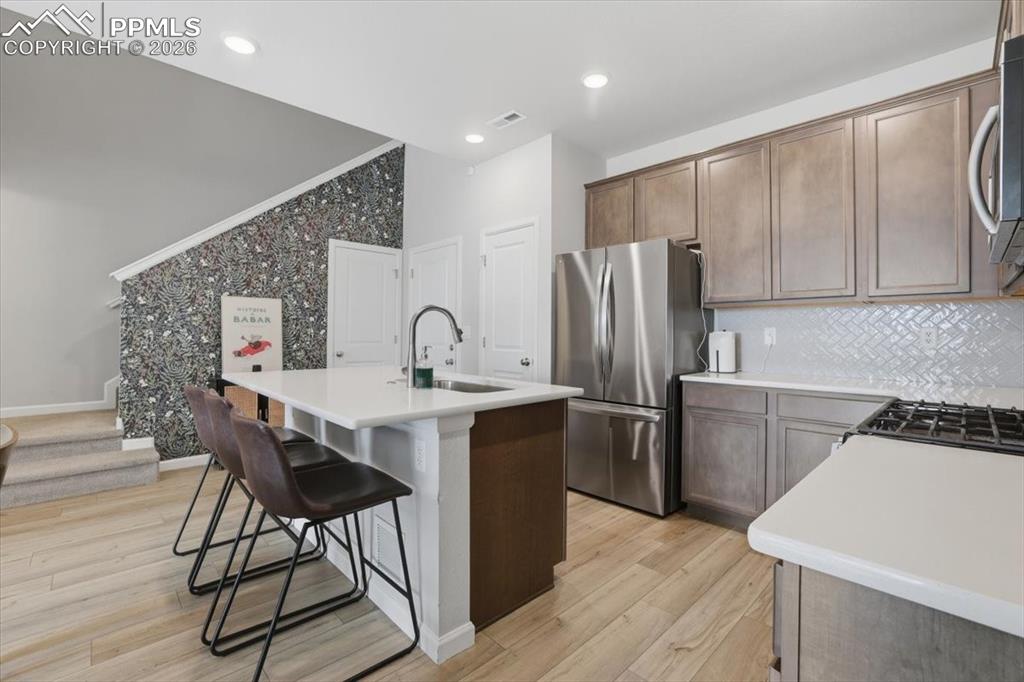 Beautiful kitchen with gas stove.