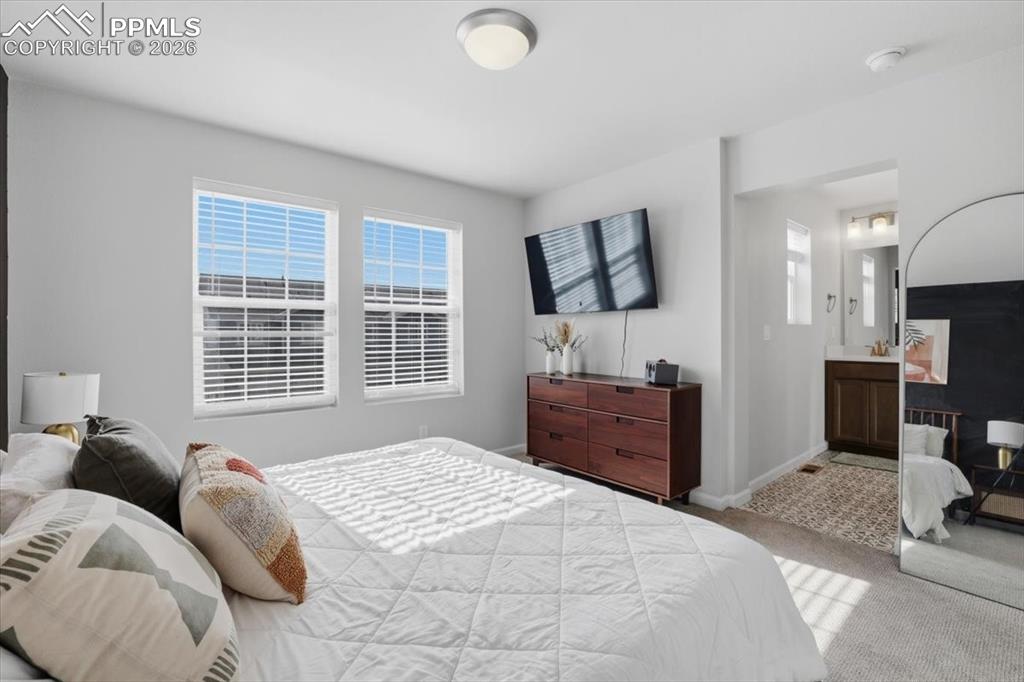 Primary suite with attached bathroom.