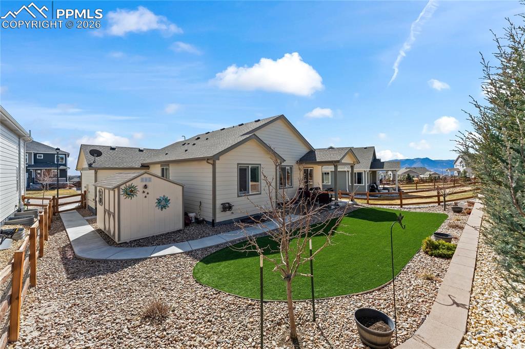 A very nice storage shed was added to the back to store the patio furniture and cushions.