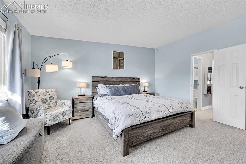 Another view of primary bedroom. 