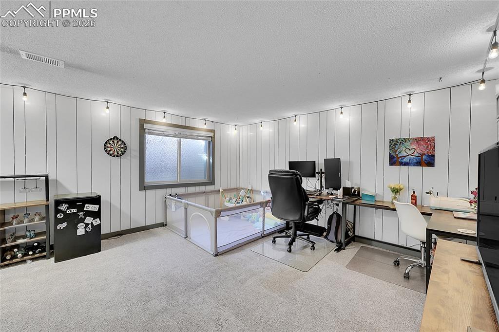 Another view of basement family room. 