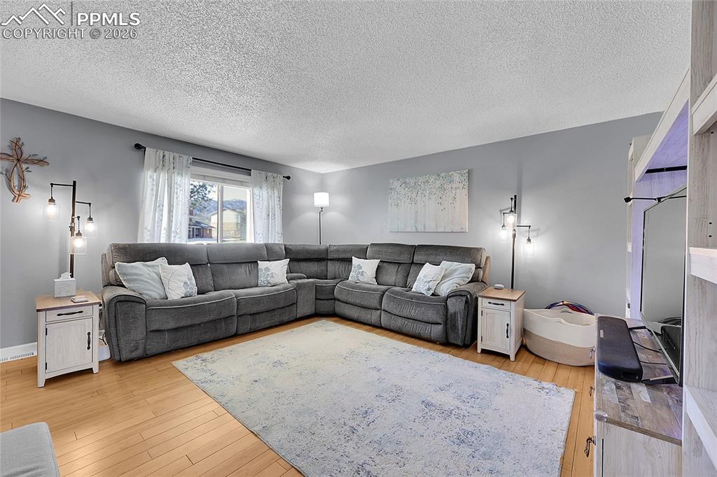 Large picture window providing tons of natural lighting.