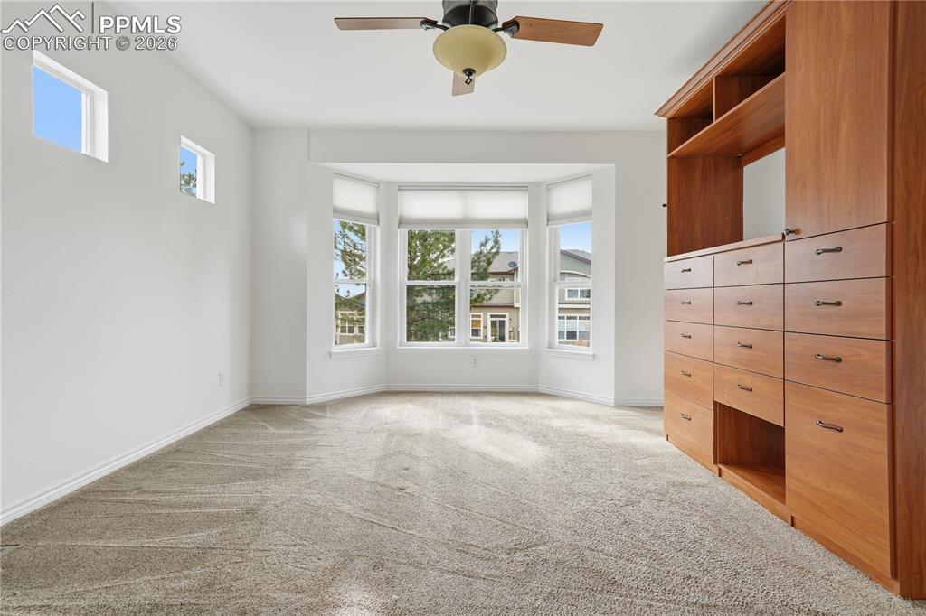 Main level primary suite with custom built wardrobe