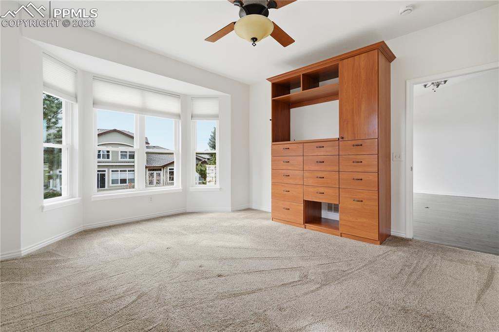 Main level primary suite with custom built wardrobe