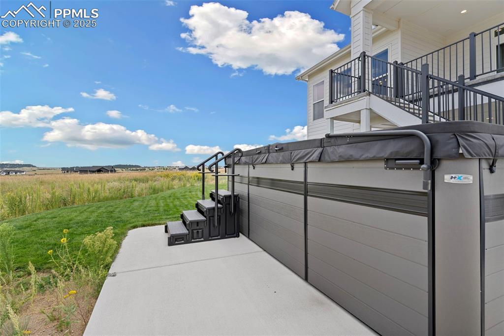 Patio / terrace with a yard and a patio