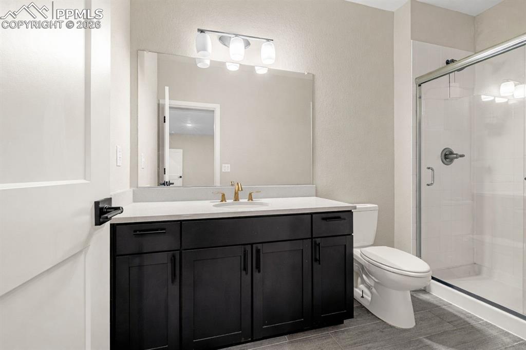 lower level bathroom with walk in shower