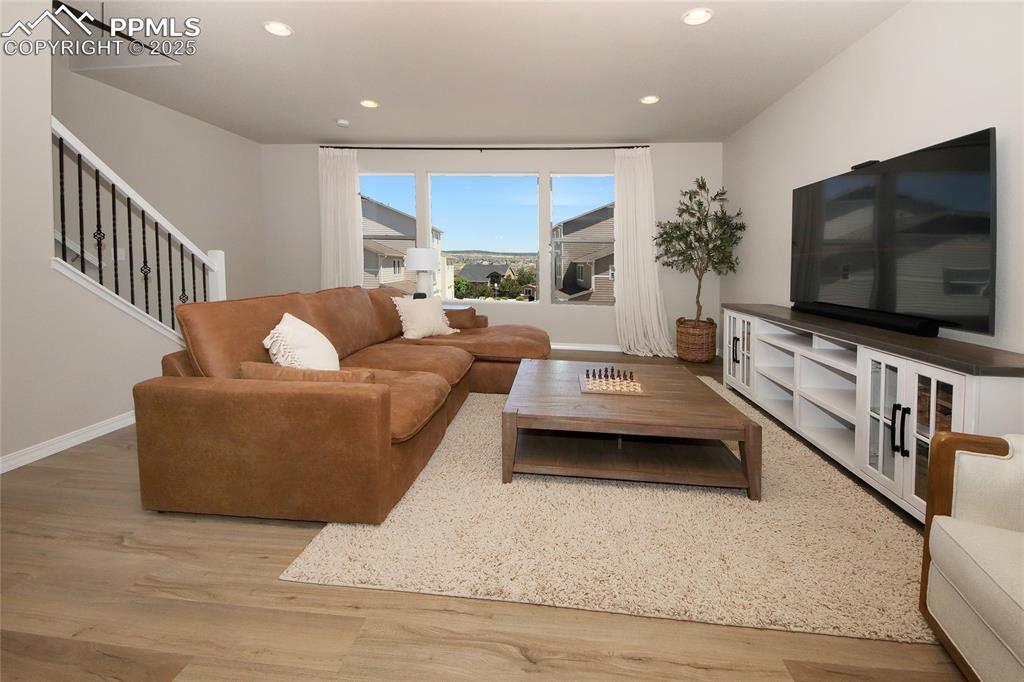 Family Room with view out the front between buildings.