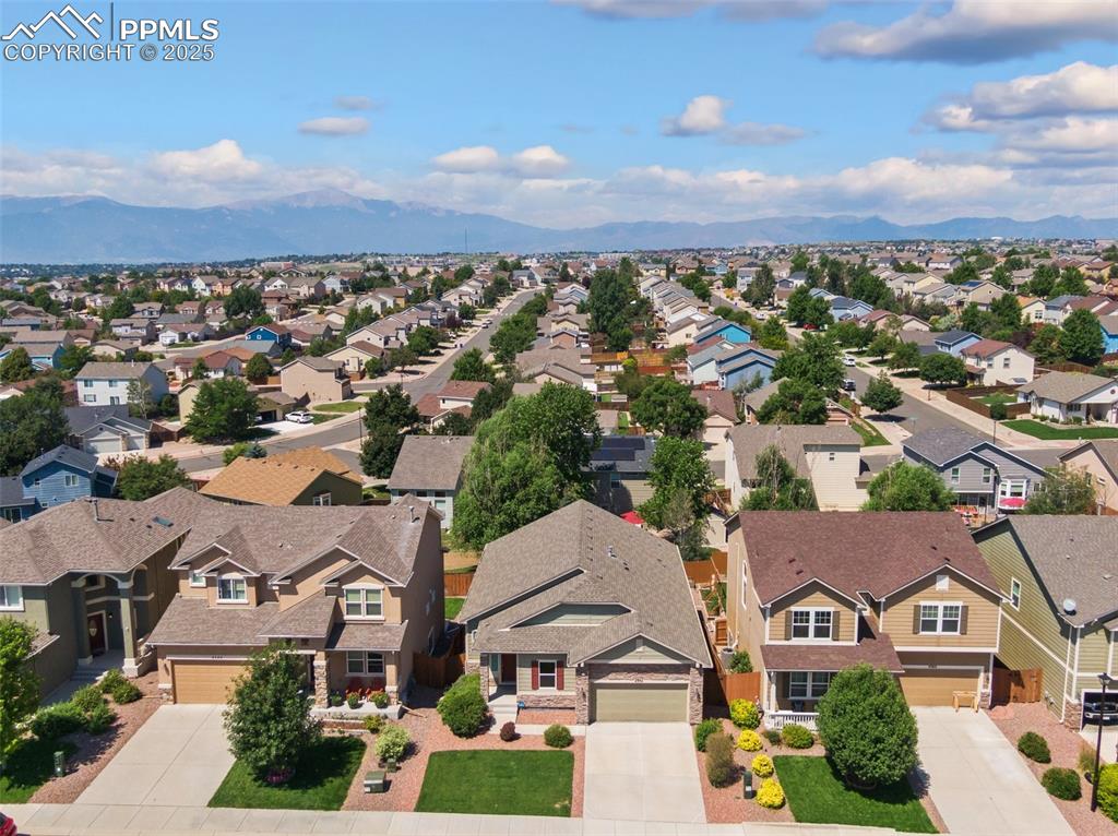 Aerial view of residential area with mountains