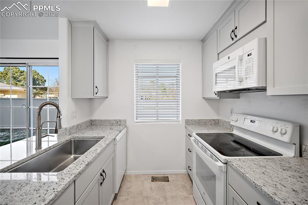 Garden window looking out to the neighborhood park. 