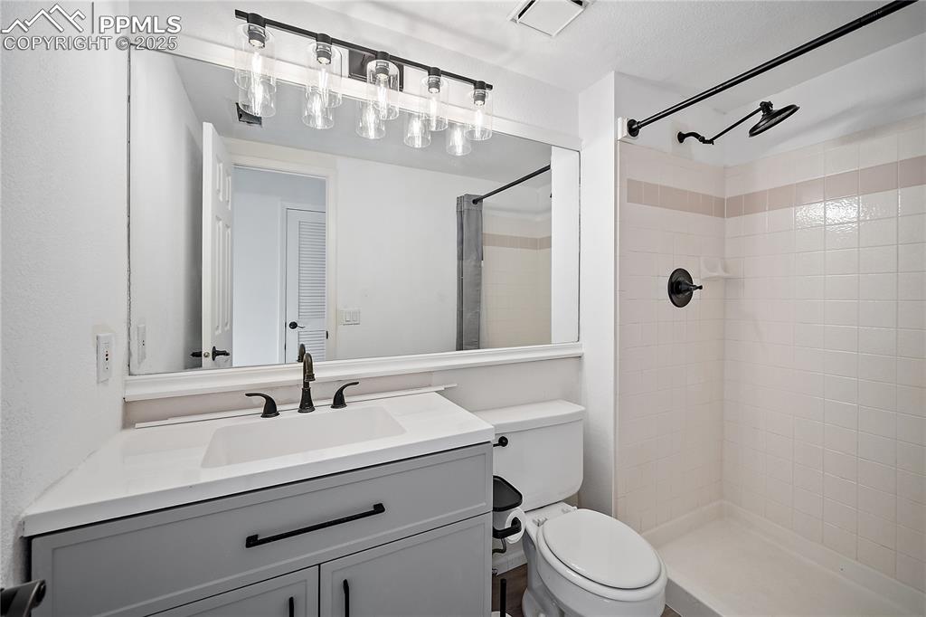 Lower level 3/4 bath with updated vanity. 