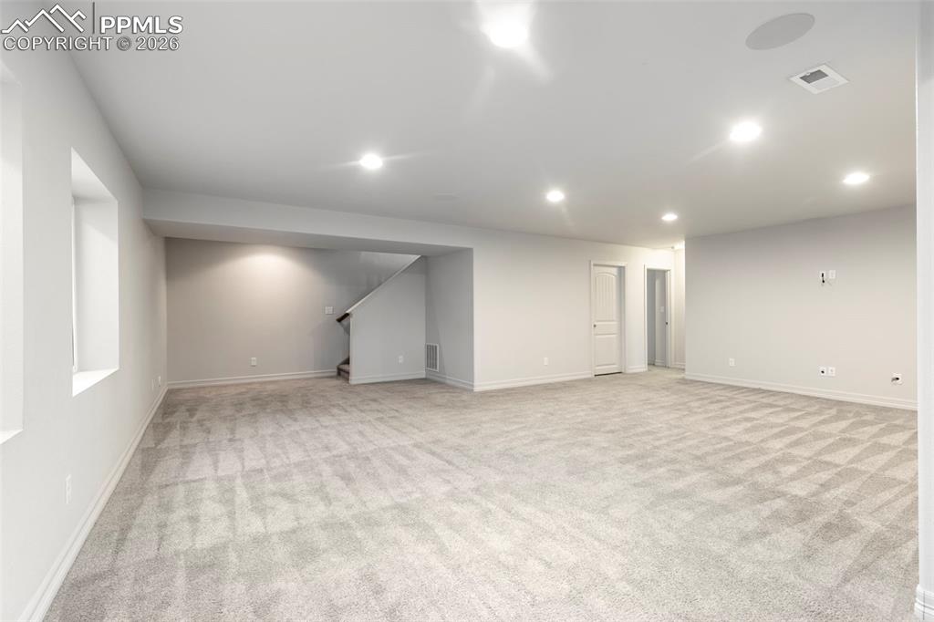 Large lower-level family room offering additional space for entertainment, fitness, or hobbies.