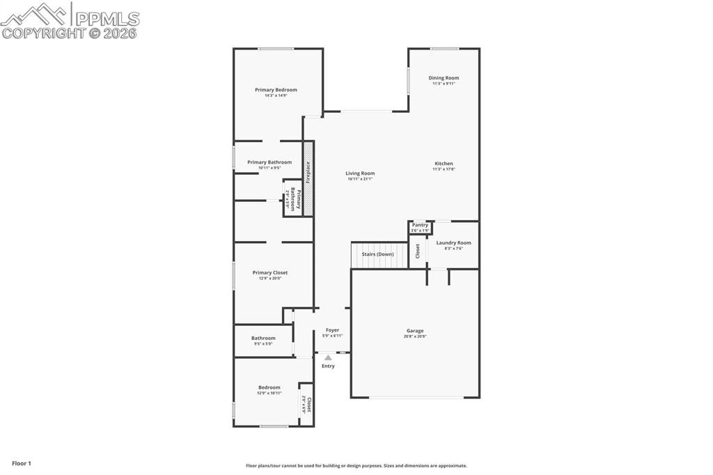 Rear view of house with a patio, stucco siding, and an outdoor fire pit