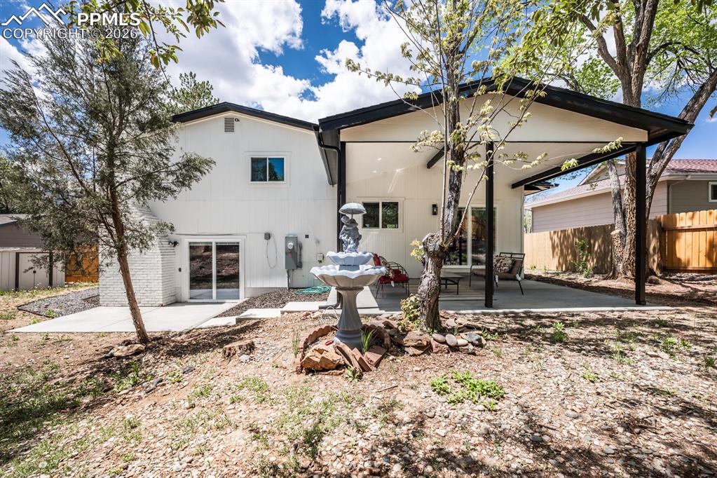 Back of property with a patio area