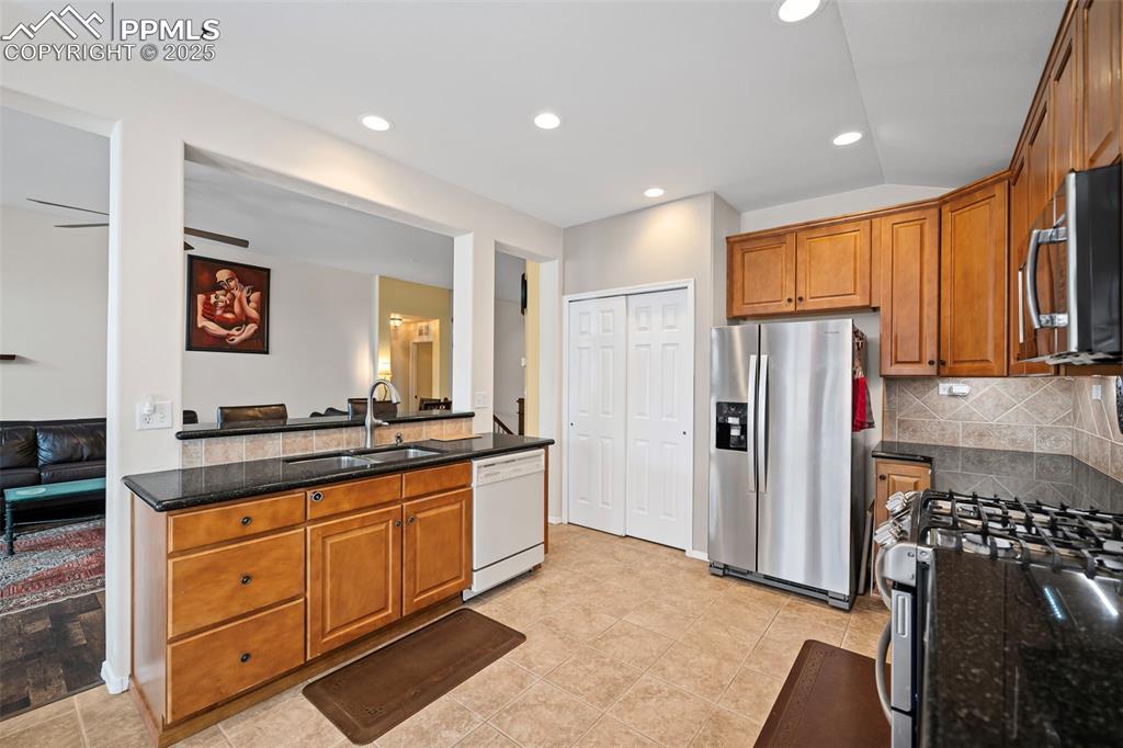 Breakfast bar overlooking the living room and a spacious pantry