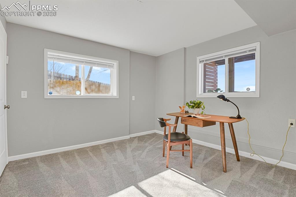 Lower Level Bedroom #4, staged as an office