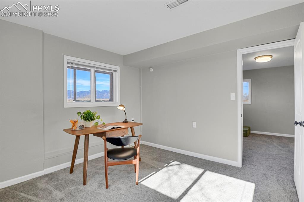 Lower Level Bedroom #4, staged as an office