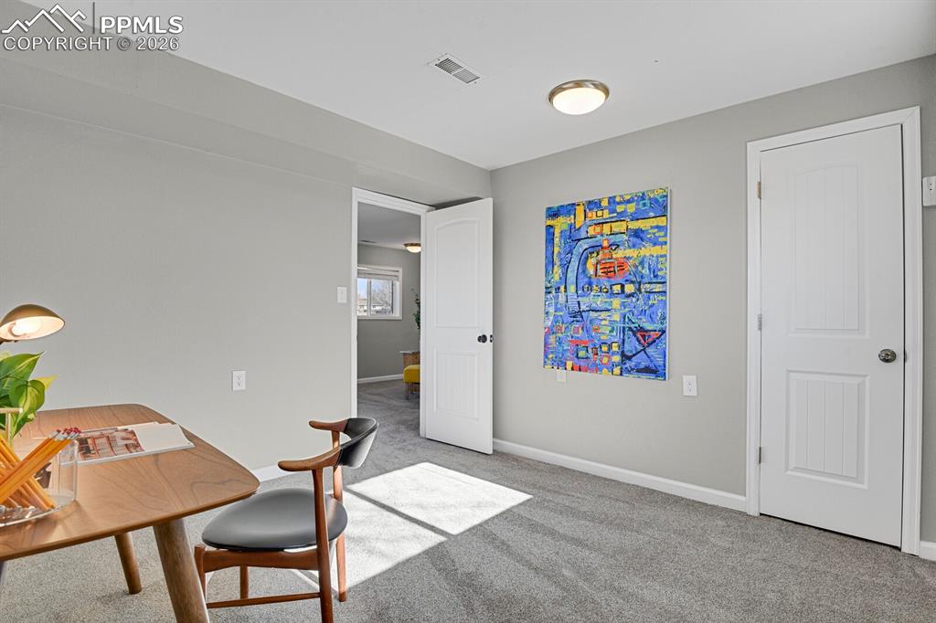 Lower Level Bedroom #4, staged as an office