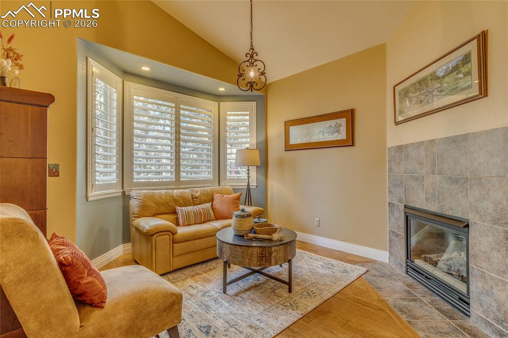 Sitting area off Primary bedroom with gas fireplace.
