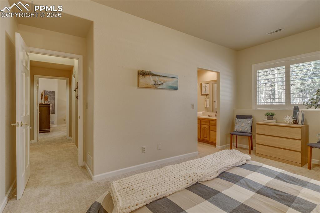 Hallway connects the two bedrooms.