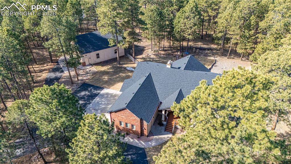 Part of the circular driveway showing the walking path to the detached structure.