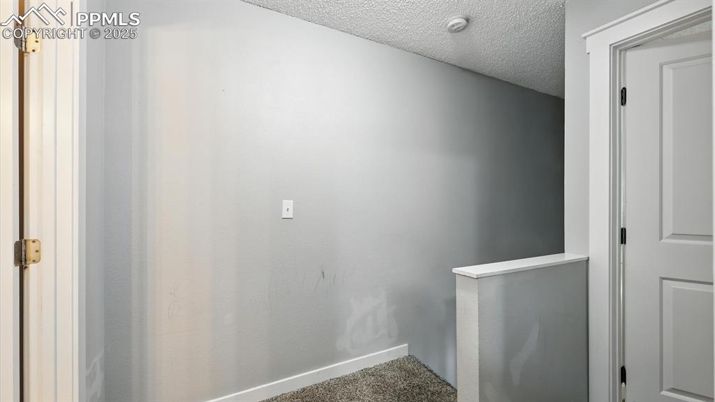 Upper Level Hallway into the Bedrooms and Bathroom.