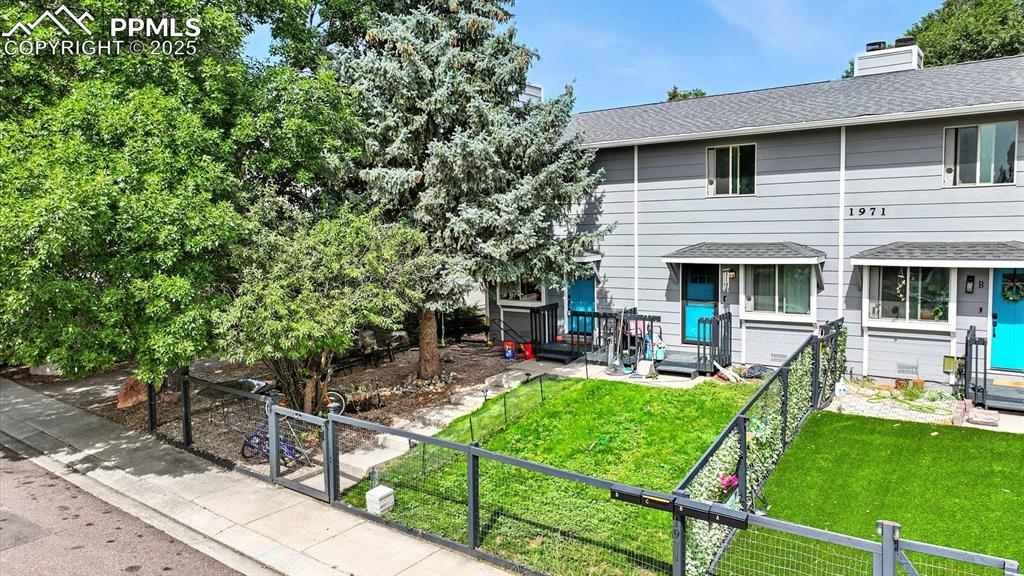 Front view of home and lot.