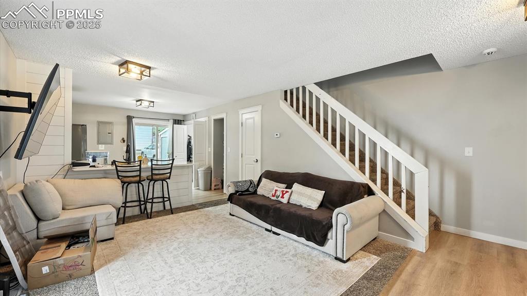 Living Room with stairs to the upper level.