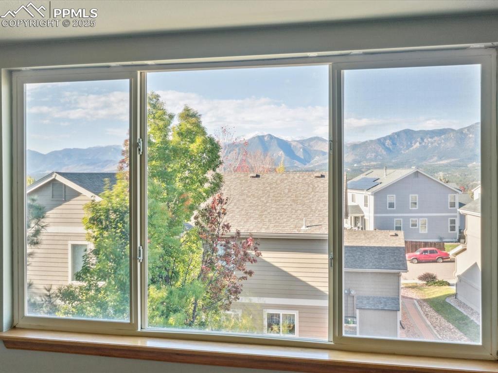 Entryway featuring a mountain view and a residential view