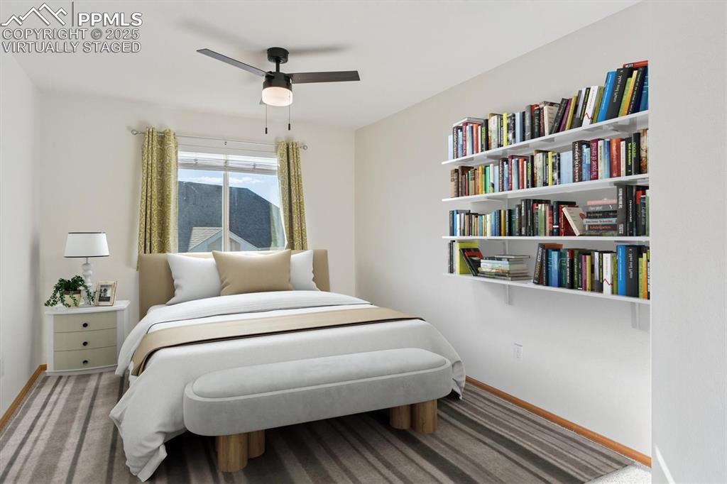 Virtually staged, Carpeted bedroom with a ceiling fan and baseboards