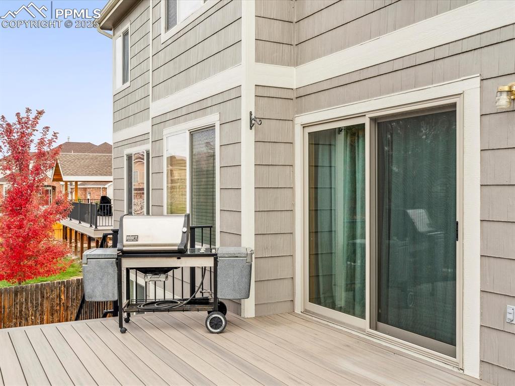 Deck featuring area for grilling