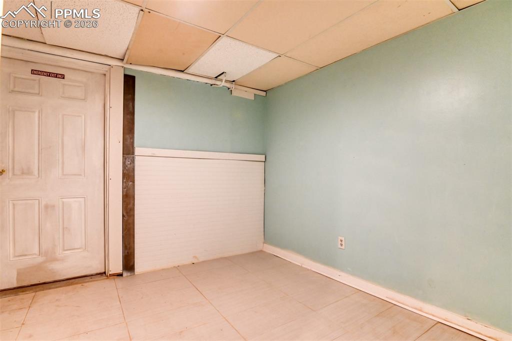 Spare room featuring a paneled ceiling