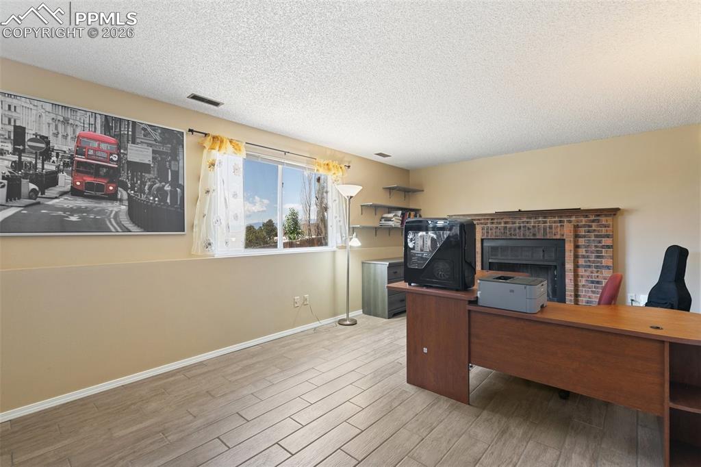 Cozy family room with wood-burning fireplace