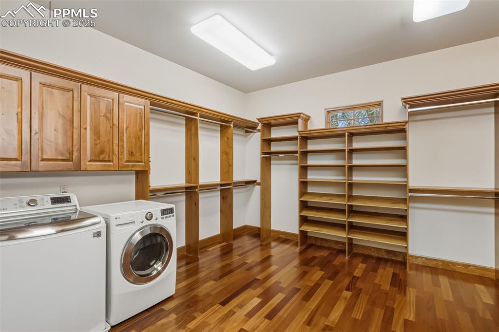Upper Primary Suite Walk-In Closet with Laundry Hookup
