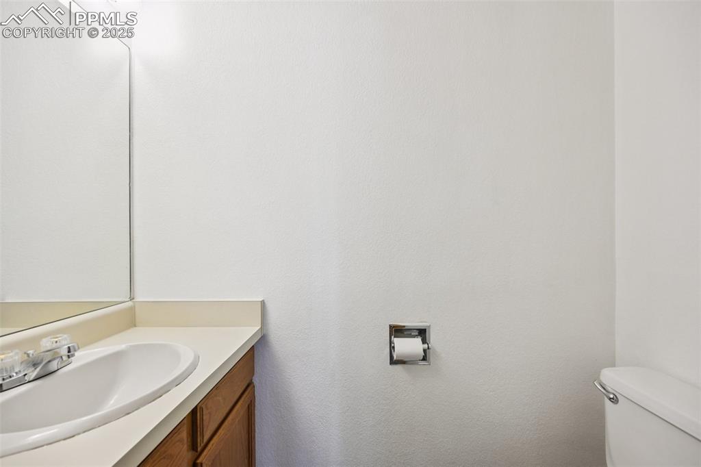 Bathroom with vanity and toilet