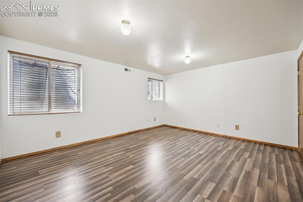 Empty room with wood finished floors