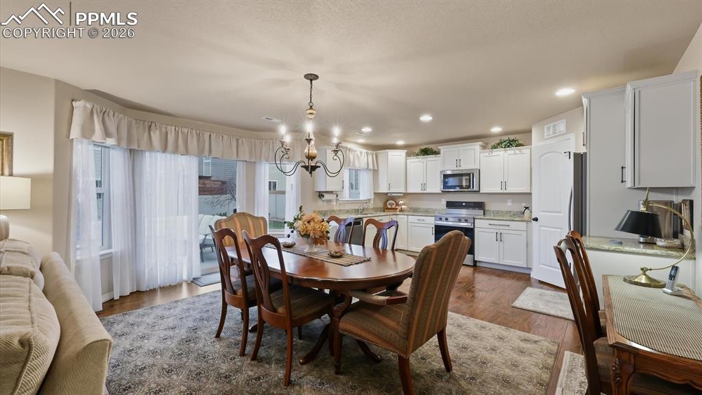 Kitchen/Dining Area with slider to the backyard patio.