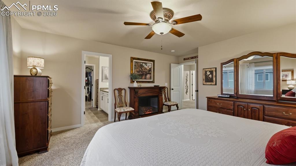 The Primary Suite is a private retreat featuring mountain views, a huge walk-in closet, and a luxurious Shower Bathroom.