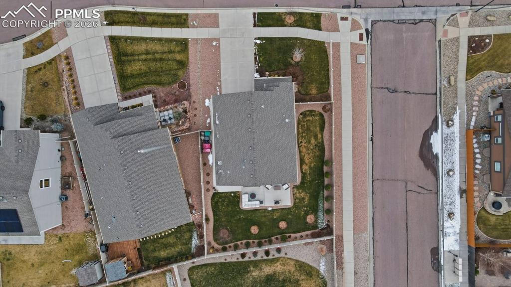 Aerial view of home and lot.