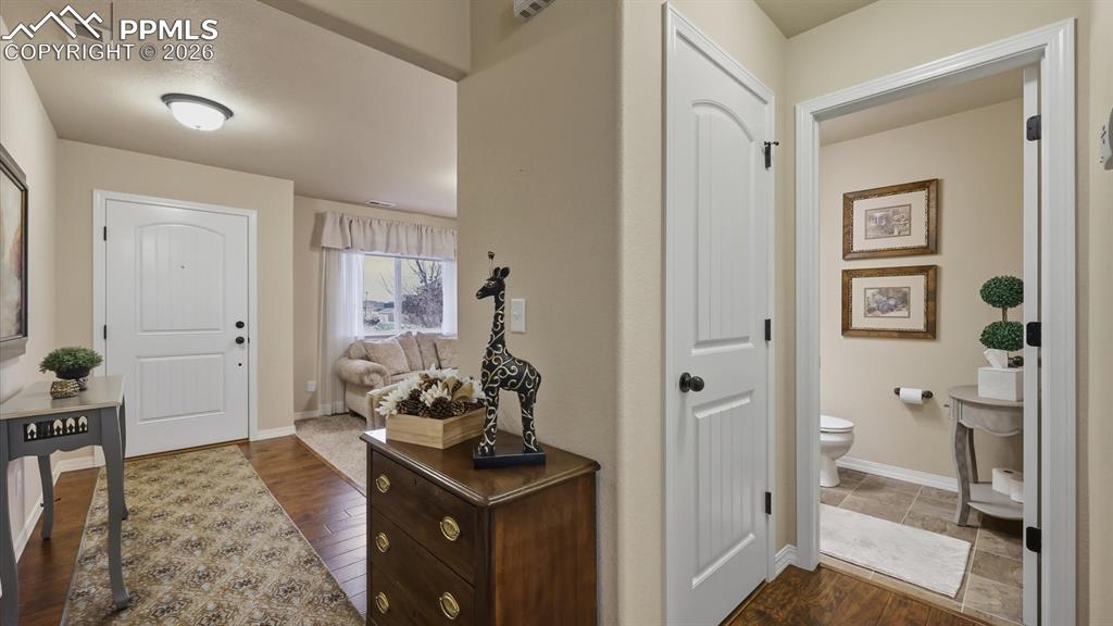Front Entry with gleaming hardwood floors.