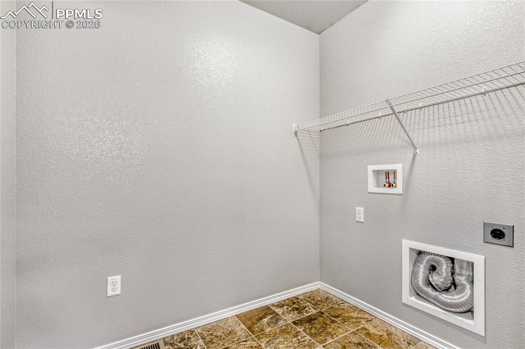 Laundry room with hookup for a washing machine and dryer