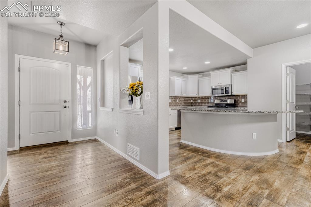 Entrance foyer with LVP flooring