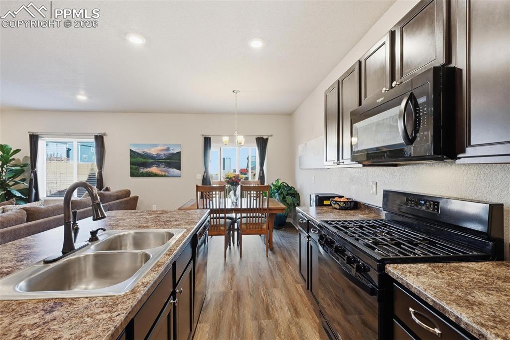 Gas stove adds to this gorgeous kitchen with Island