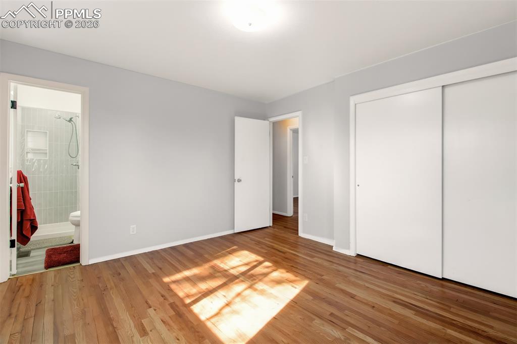 primary bedroom with attached 3/4 bath