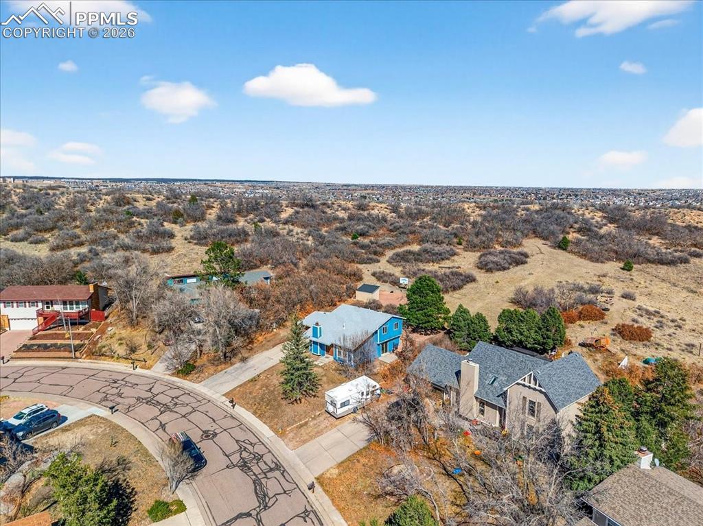 Aerial view of sparsely populated area with a desert landscape