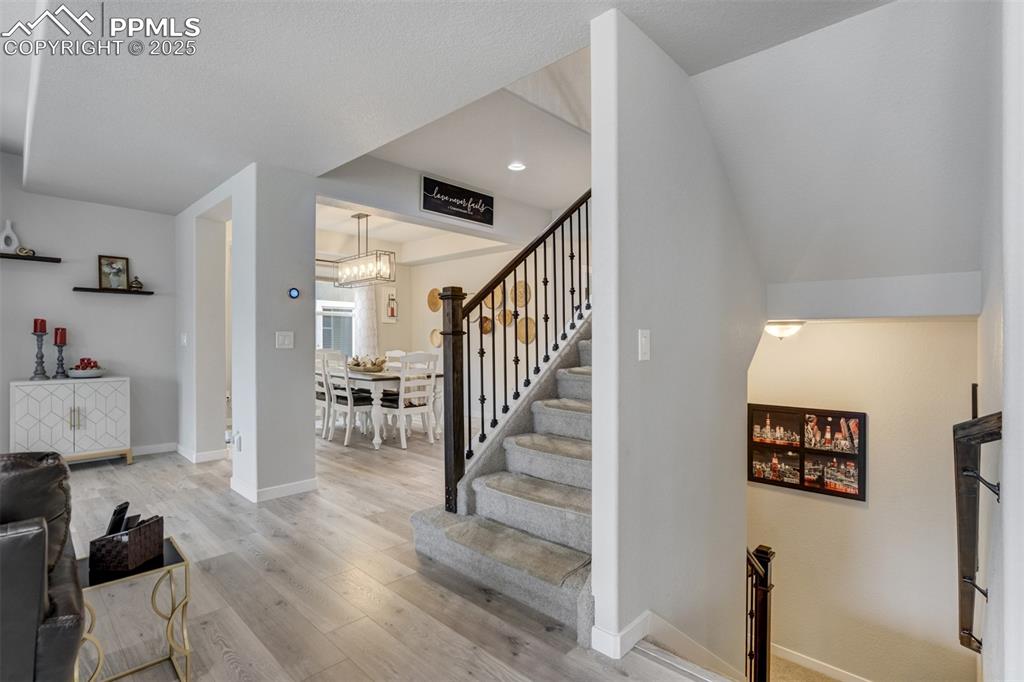 Stairs to upper and lower level